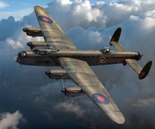 Lancaster PH-D in flight above clouds